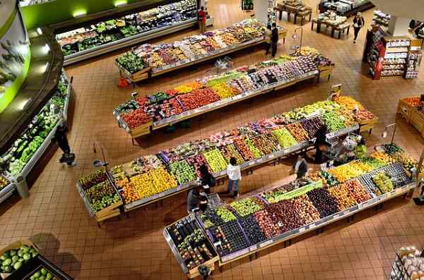 Looking down on a large produce section of a grocery or supermarket.